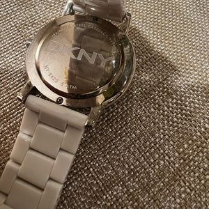 Simple white clean look DKNY watch with sparkle.